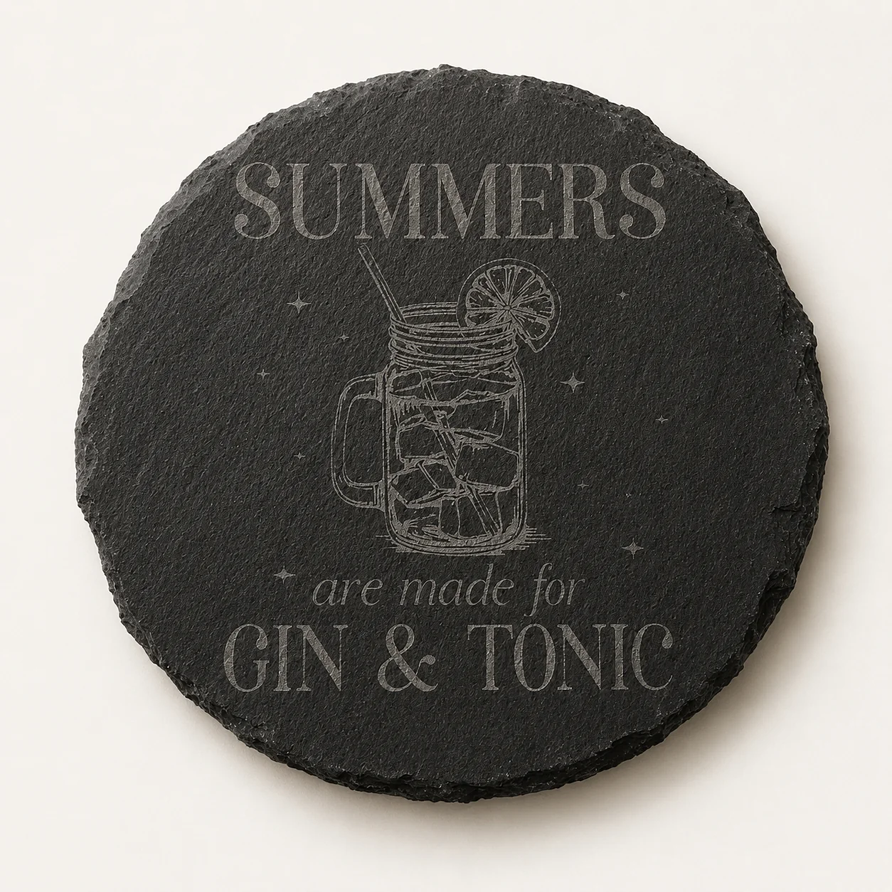 Round black slate coaster engraved with a gin and tonic summer design